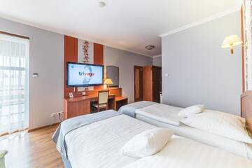 Фото номера Просторный двухместный номер с 2 отдельными кроватями Отель Hotel Doris г. Оборники 5