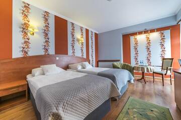 Фото номера Просторный двухместный номер с 2 отдельными кроватями Отель Hotel Doris г. Оборники 9