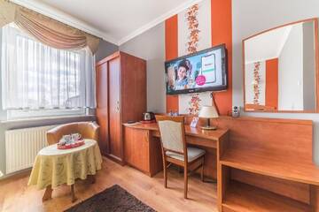 Фото номера Двухместный номер с 1 кроватью Отель Hotel Doris г. Оборники 4
